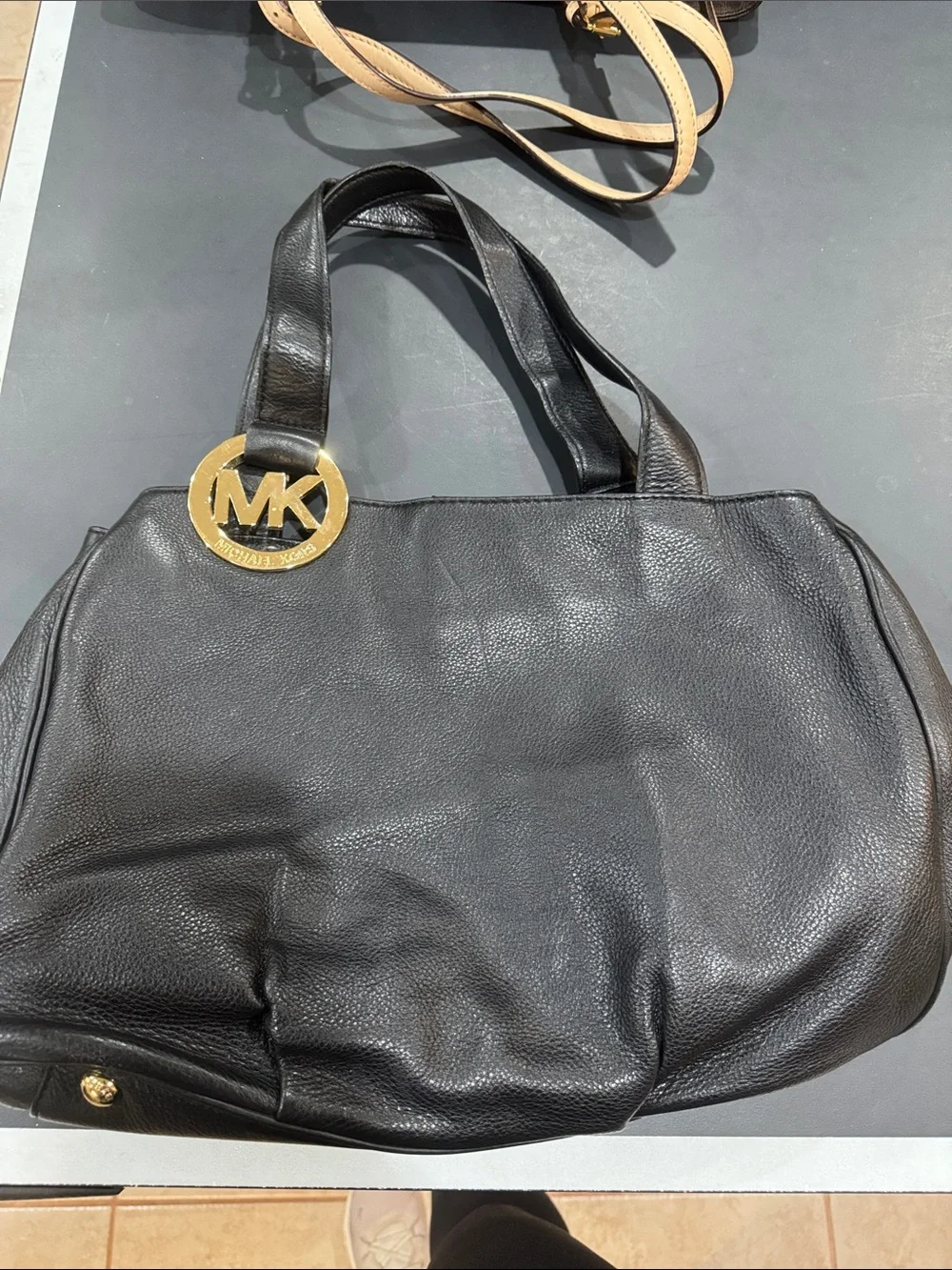Michael Kors Black Pebbled Leather Tote with Gold MK Medallion